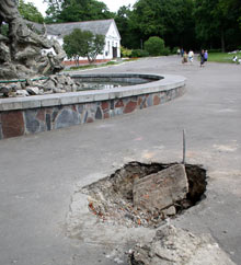 г-